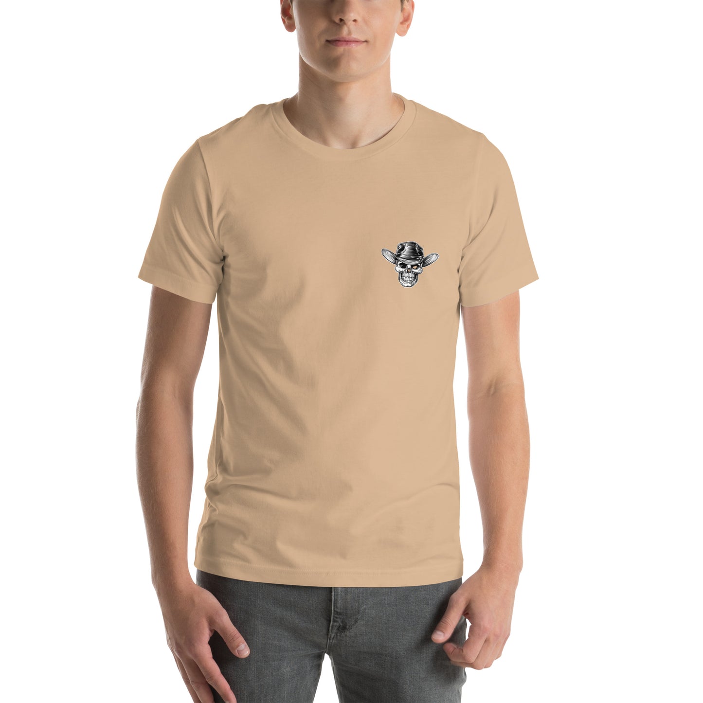 Front view of model wearing a tan t-shirt with a skull wearing a cowboy hat graphic.